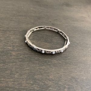 Light white gem stretch bangle. Never before worn.